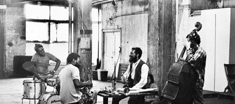 Post-bop musicians in a rehearsal space